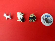 3 ANIMAL BADGES & 1 RSPCA SUPPORTERS BADGE.