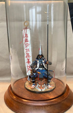 Samurai General . 90mm painted figure with glass display case on wooden base .