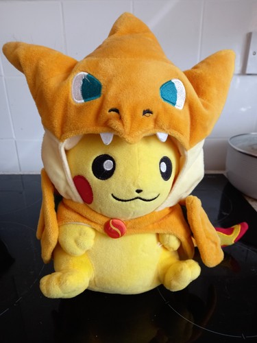 Pikachu wearing charizard - pikachu, y
