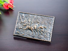 Bronze relief, cast bronze