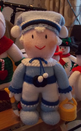 Hand knitted frosty figure - hand,