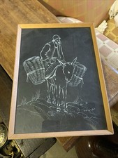 Picture Of Man Riding A Donkey Etching On Black Surface Arabic Or Persian Script