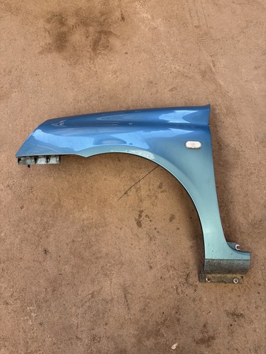 Passenger side front wing - side, for