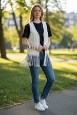white fringe vest is a popular