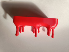 Red Drip Shelf Melting Wall
