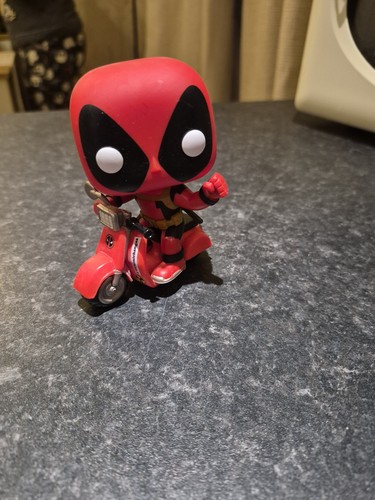 Deadpool with scooter marvel - deadpool,