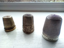 Silver plated thimbles trio (2