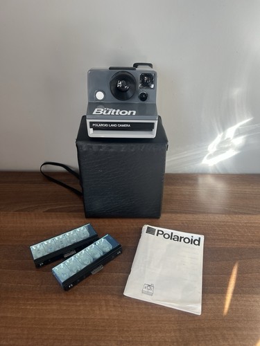 Polaroid camera the button - the,