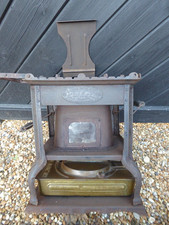 Vintage French made 'Flamme Bleue ' no.2 Stove . Cast Iron Stove with Brass base