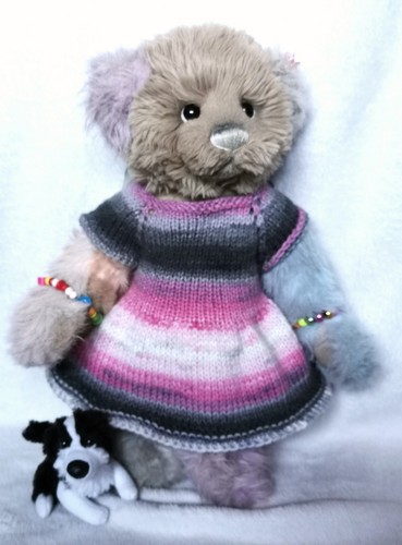 Hand knitted teddy bear