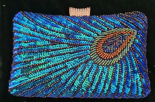 Stunning peacock sequin - stunning,