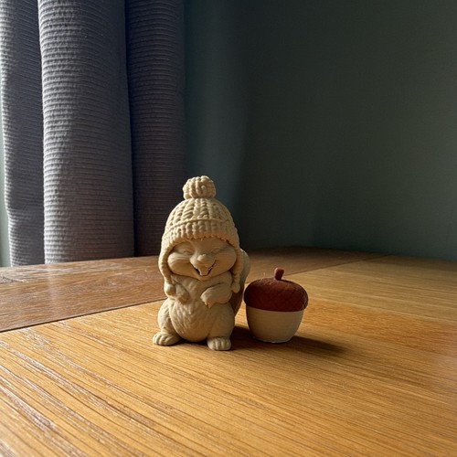 Squirrel and his acorn - his,