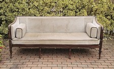 A Regency  Eight Leg Sofa with Carved Legs and Brass Inlay C1800-10