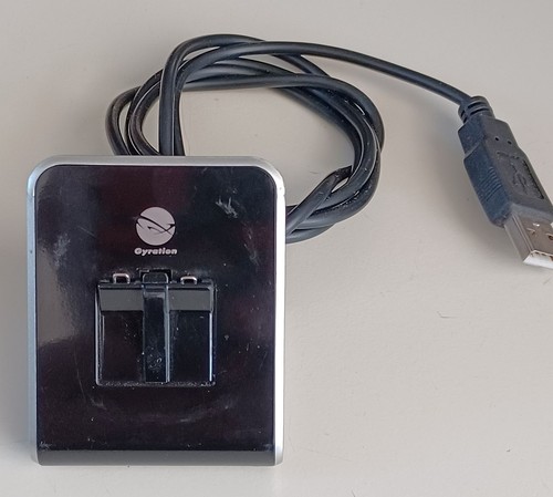 Gyration mouse charging cradle
