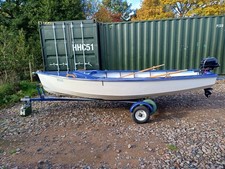 4.1 mtr / fishing boat / rowing boat with   outboard  engine and road trailer