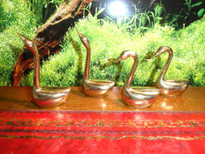 FAMILY OF SOLID BRASS GEESE /  SWANS ?