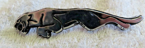 Leaping cat figure from - , jaguar