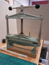 Multi purpose book press for