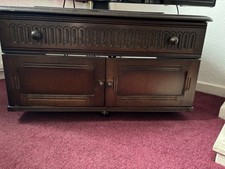 Dark Wood Tv And Media Cabinet With Opening Doors And Pull Down Door To Front