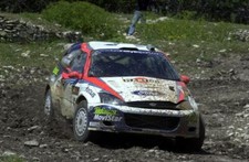 Colin McRae with his damaged