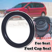 Fuel cap seal for seat - for,