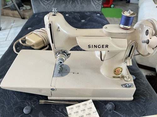 Vintage 1964 white singer - vintage,