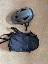 EVOC Ride Performance Backpack 8L Stone/Dark Olive With Specialized MTB Helmet