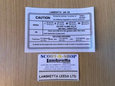 LAMBRETTA SX 200 RUNNING IN STICKER. SX200 CC.LEG SHIELD STICKER -  BRAND NEW.