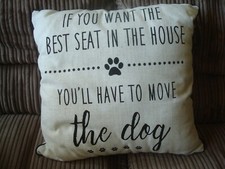 IF YOU WANT THE BEST SEAT IN THE HOUSE YOU'LL HAVE TO MOVE THE DOG CUSHION SOFA.