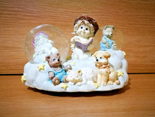 Heavy musical childrens snow globe with cat dod and teddy Brahns lullaby