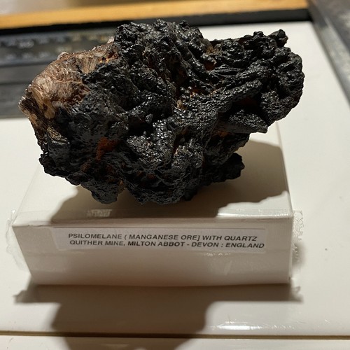 Psilomelane with quartz - with,