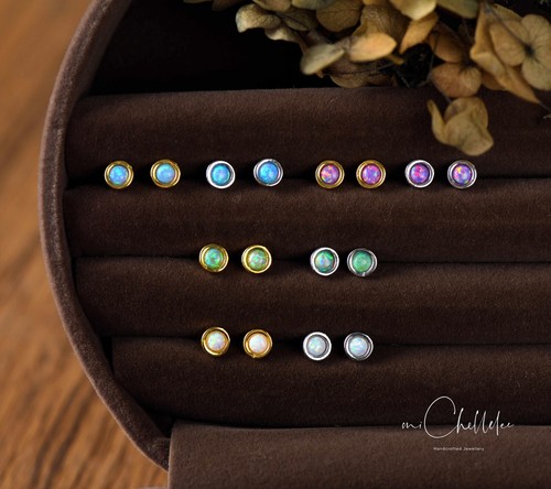 Tiny opal stud earrings white - tiny,