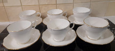 SET OF SIX VINTAGE MISMATCHED BONE CHINA WHITE & GOLD TEA CUPS & SAUCERS