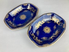 A PAIR VINTAGE MALING POWDER