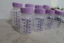 8 Sterifeed Baby Bottles 4x 100ml 4x 130 ml with 8 purple lids