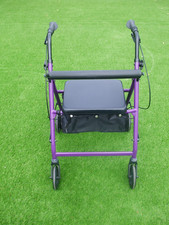 4 wheel mobility walker with seat foldable.Excellent condition
