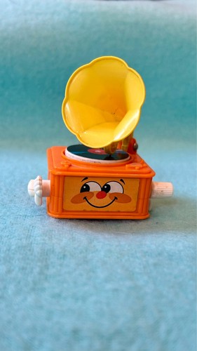 Tomy wind clock work - wind-up,