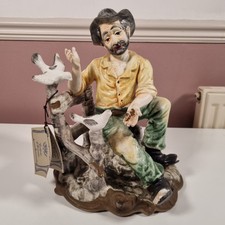 Capodimonte Style Figurine “Man on Stump by Fence with Two Birds” 12" High