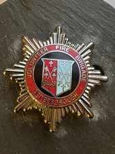 PETERBOROUGH VOLUNTEER FIRE BRIGADE CAP BADGE. Chrome Variant