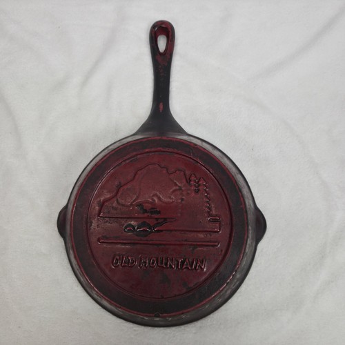 Vintage old mountain cast iron - mountain,