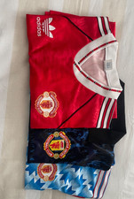 Boys Manchester United football shirts x 3.  Very good condition 