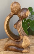 Wood Sculpture Kissing Couple