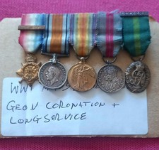 A PERIOD WW1 MINIATURE MONS STAR MEDAL GROUP