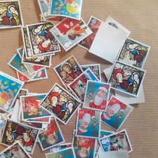 50 X   1st Class Mix GB Xmas Stamps Unfranked Off Paper Used