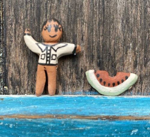 Navajo pottery storyteller man - pottery,