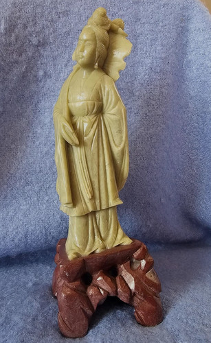 Carved soapstone figurine a - carved, of