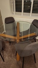 Glass Topped Dining Table And