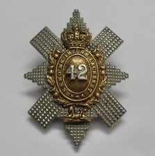 BRITISH ARMY CAP BADGE. THE