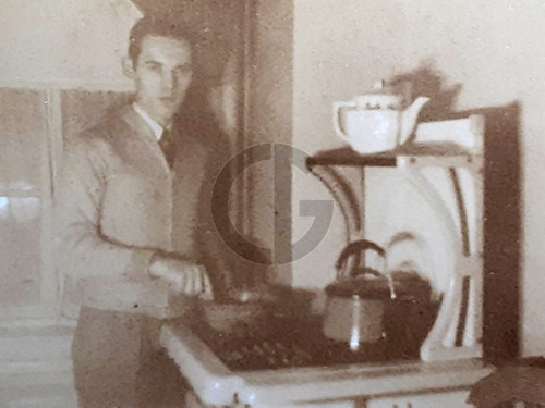 Man cooking pot - on, kitchen