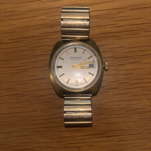 Gold tone caravelle bulova - caravelle,
